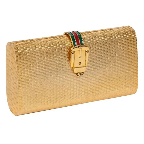 gucci clutch gold|gold Gucci purse.